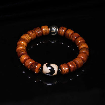 Tibetan Dzi Yak Bone Talisman Bracelet - Courage & Ancestral Guardianship